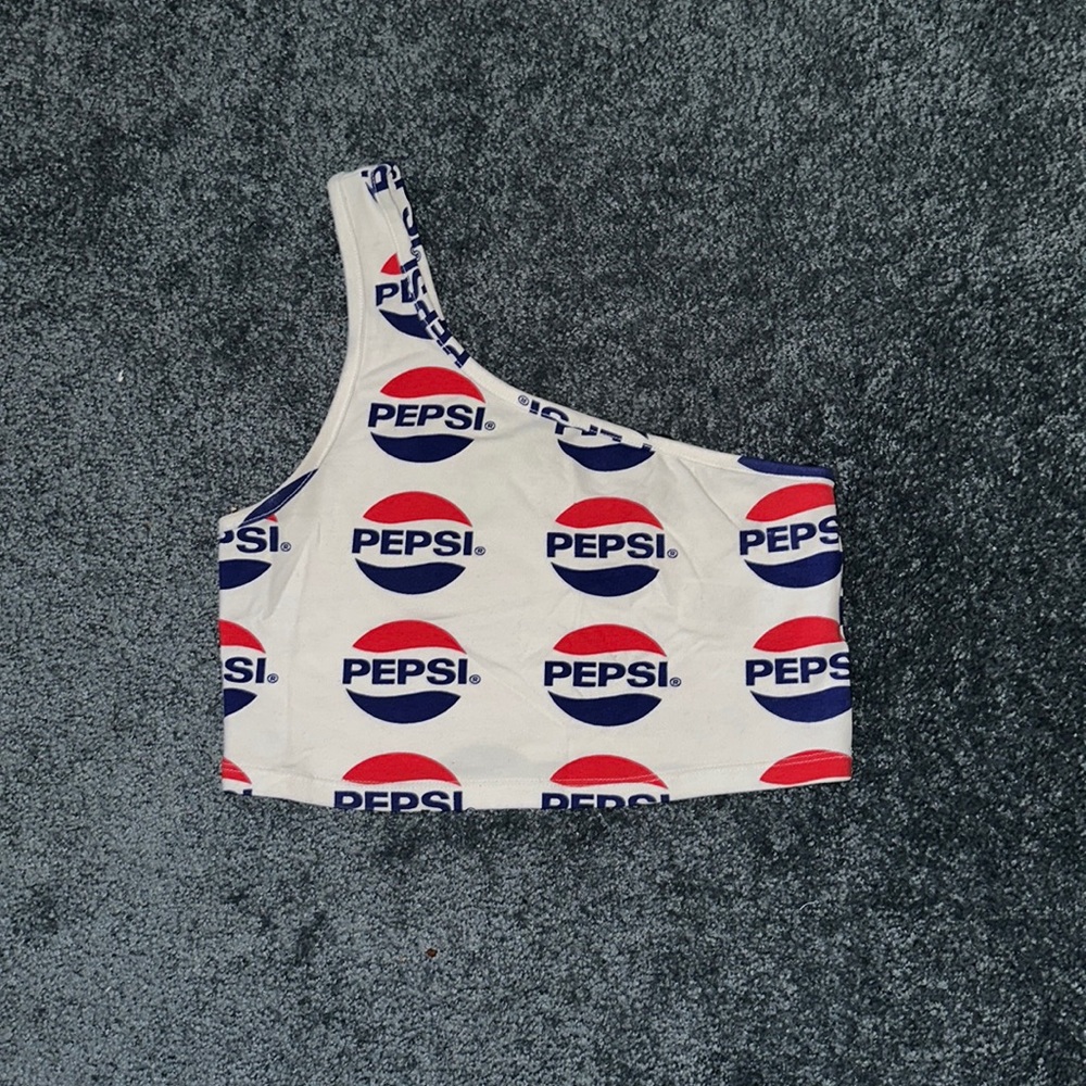 One strap. PEPSI CROP TOP shirt. Super cute in person. Only worn ONCE